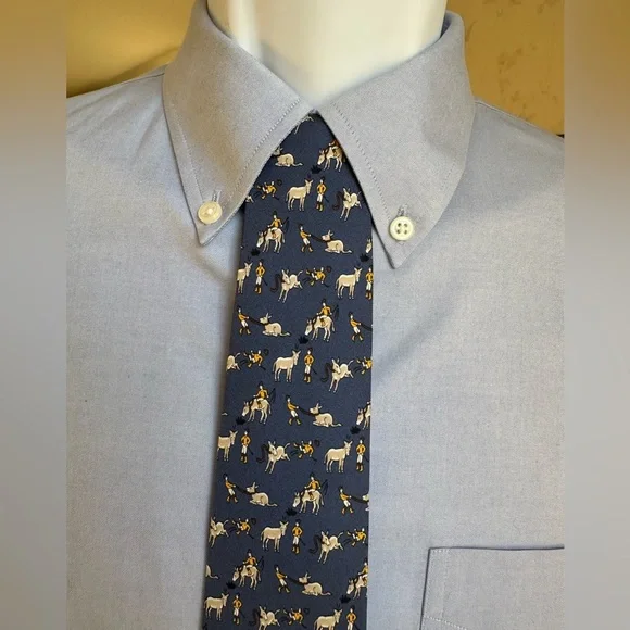 Hermes . Blue Tie with Donkey and Jockey Print. Made it France. 100% silk. - Picture 3 of 11